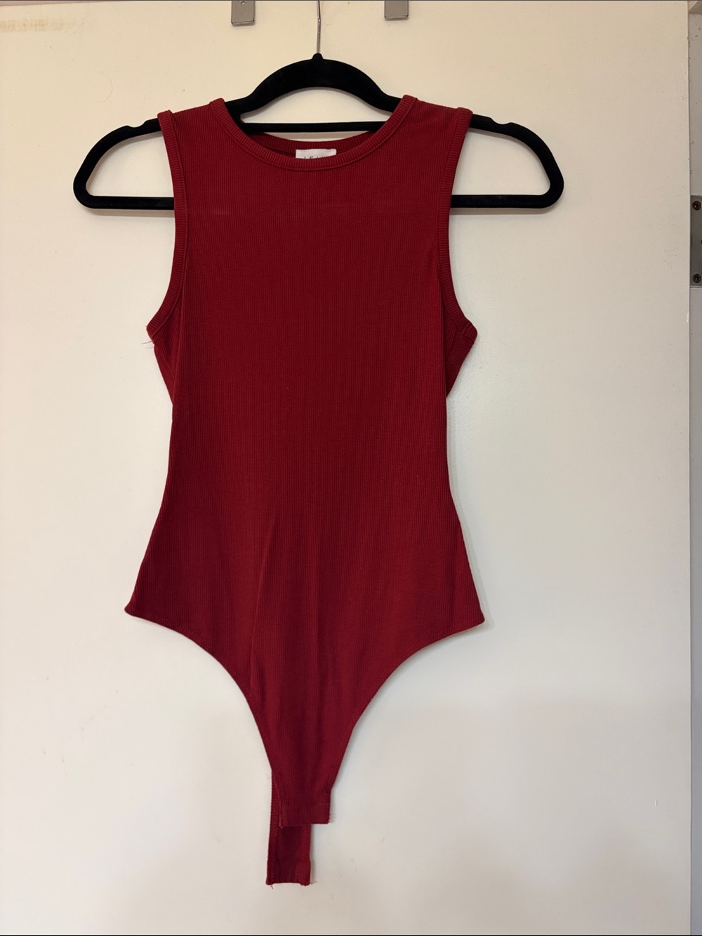 Le Lis Sleeveless Ribbed Bodysuit in Deep Red